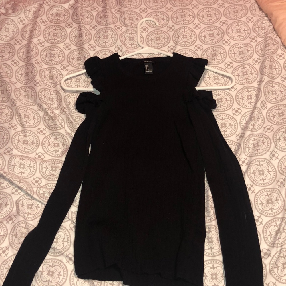 black ruffled top